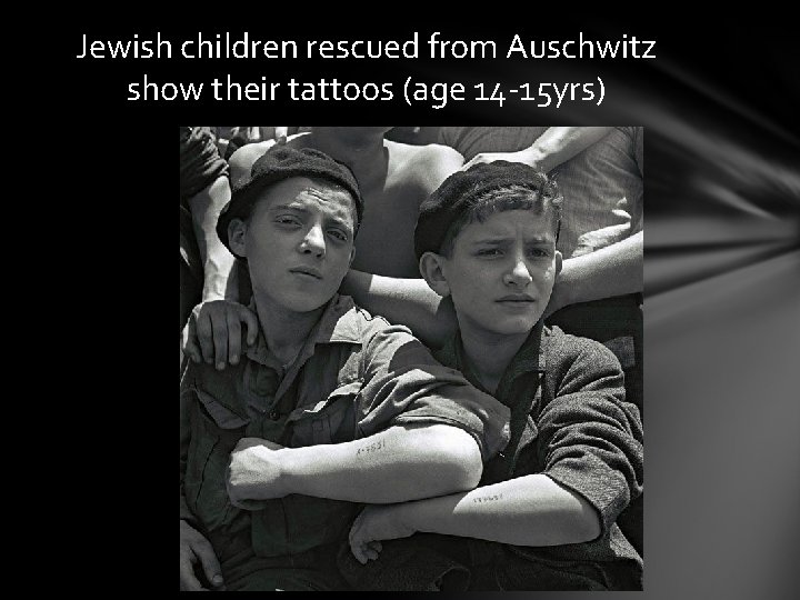 Jewish children rescued from Auschwitz show their tattoos (age 14 -15 yrs) 