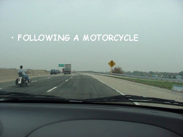  • FOLLOWING A MOTORCYCLE 