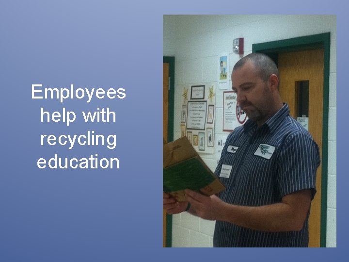 Employees help with recycling education 