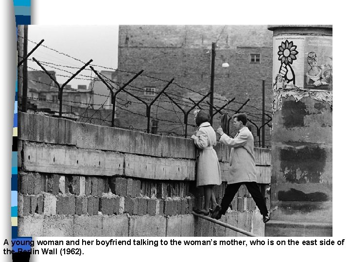 A young woman and her boyfriend talking to the woman’s mother, who is on
