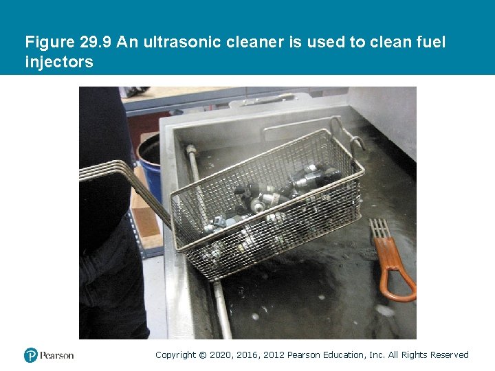 Figure 29. 9 An ultrasonic cleaner is used to clean fuel injectors Copyright ©