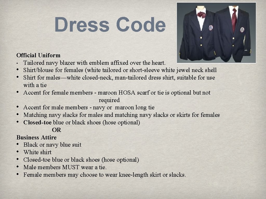 Dress Code Official Uniform • Tailored navy blazer with emblem affixed over the heart.