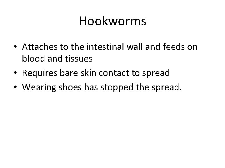 Hookworms • Attaches to the intestinal wall and feeds on blood and tissues •