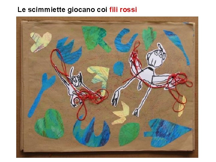 Le scimmiette giocano coi fili rossi 