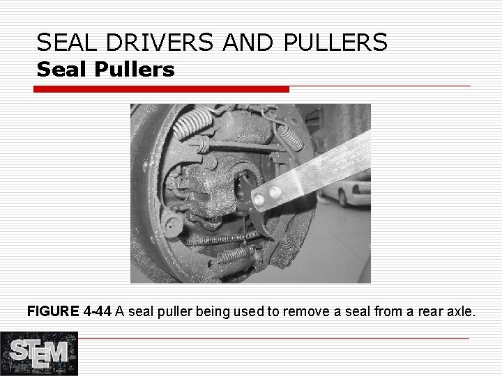 SEAL DRIVERS AND PULLERS Seal Pullers FIGURE 4 -44 A seal puller being used