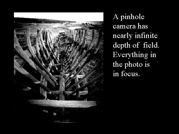 A pinhole camera has nearly infinite depth of field. Everything in the photo is