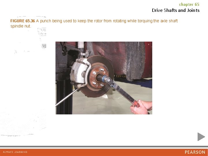 chapter 65 Drive Shafts and Joints FIGURE 65. 36 A punch being used to