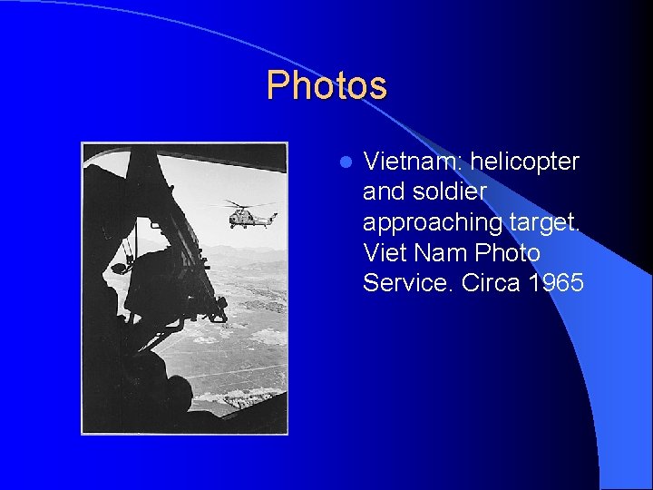 Photos l Vietnam: helicopter and soldier approaching target. Viet Nam Photo Service. Circa 1965