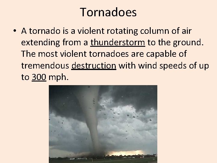 Tornadoes • A tornado is a violent rotating column of air extending from a