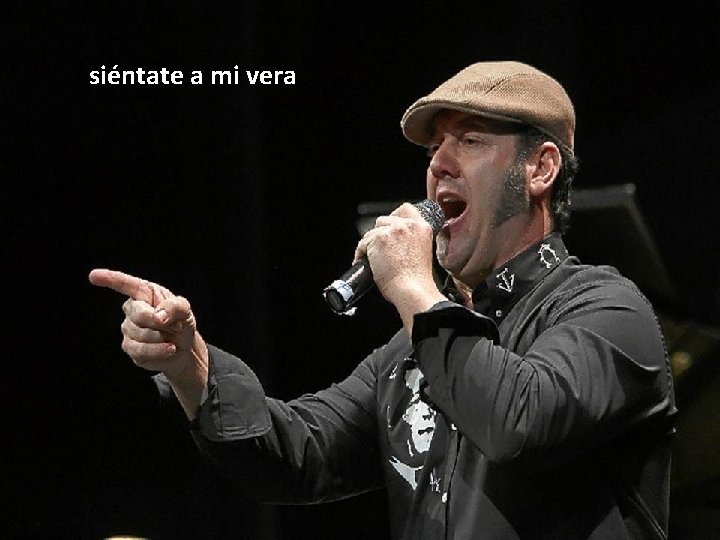 siéntate a mi vera 