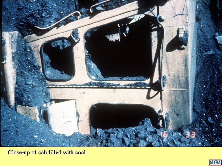 Close-up of cab filled with coal. Close-up of cab filled with coal.