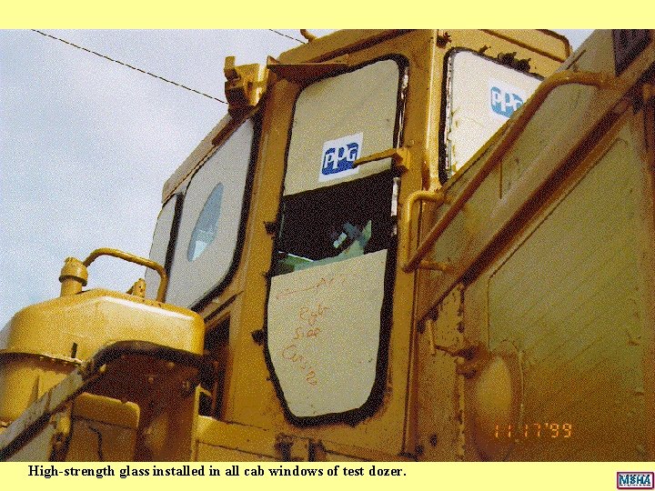 High-strength glass installed in all cab windows of test dozer. High-strength glass installed in all cab windows of test dozer.