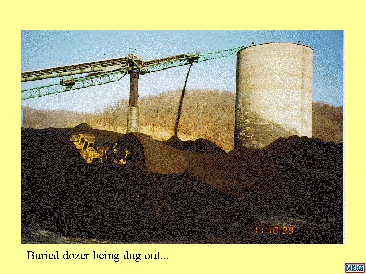 Buried dozer being dug out. . . Buried dozer being dug out. . .