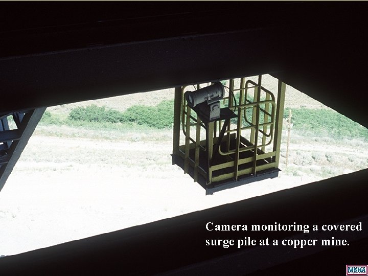 Camera monitoring a covered surge pile at a copper mine. Camera monitoring a covered surge pile at a copper mine.