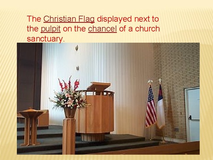 The Christian Flag displayed next to the pulpit on the chancel of a church