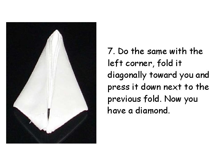 7. Do the same with the left corner, fold it diagonally toward you and