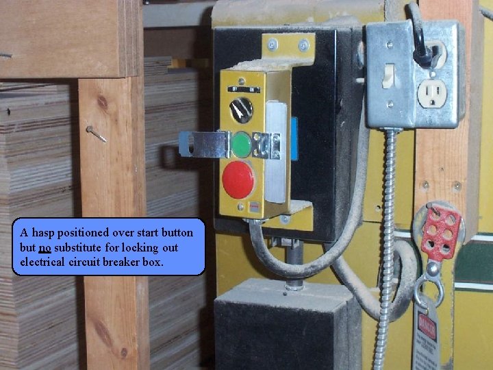 Manufacturing Lockout/Tagout A hasp positioned over start button but no substitute for locking out