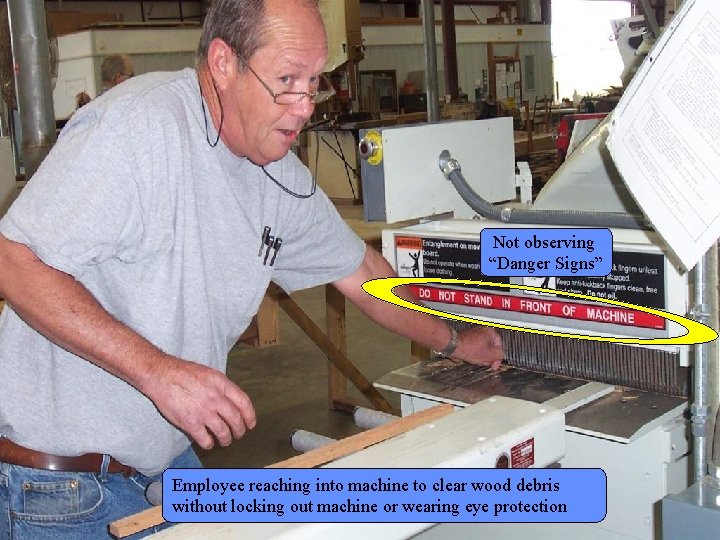Manufacturing Lockout/Tagout Not observing “Danger Signs” Employee reaching into machine to clear wood debris