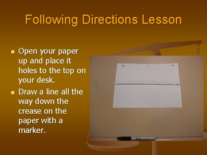 Following Directions Lesson n n Open your paper up and place it holes to