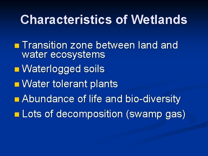 Characteristics of Wetlands n Transition zone between land water ecosystems n Waterlogged soils n