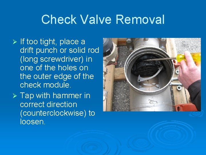 Check Valve Removal If too tight, place a drift punch or solid rod (long