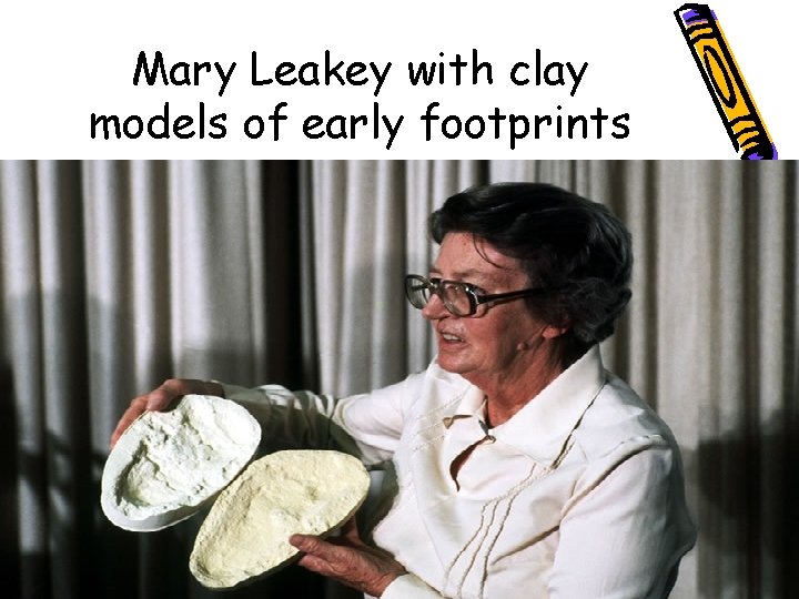 Mary Leakey with clay models of early footprints 