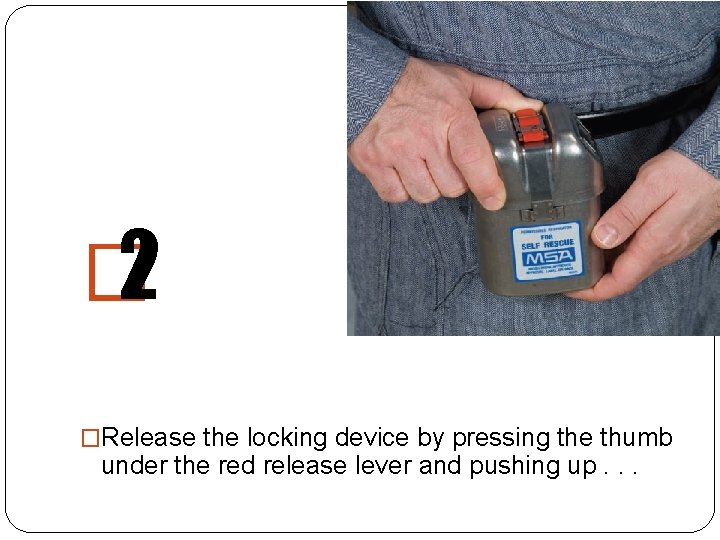� 2 �Release the locking device by pressing the thumb under the red release