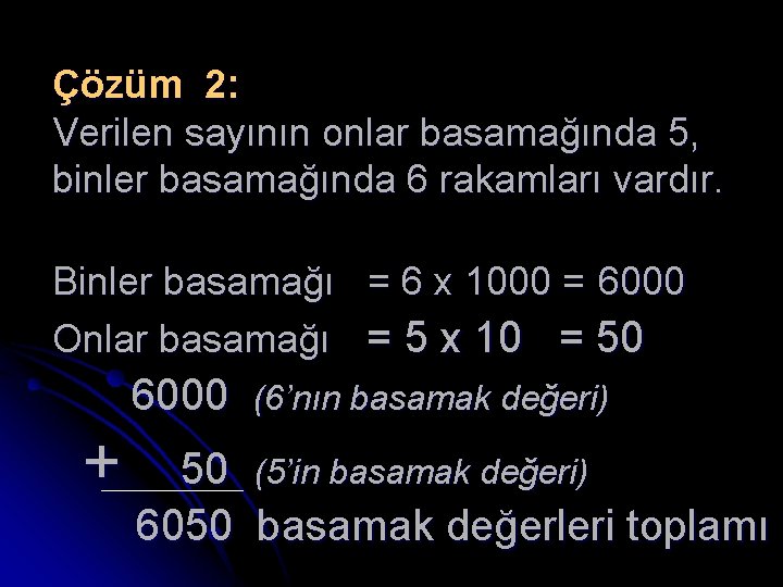 Çözüm 2: Verilen sayının onlar basamağında 5, binler basamağında 6 rakamları vardır. Binler basamağı