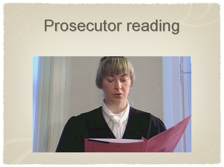 Prosecutor reading 