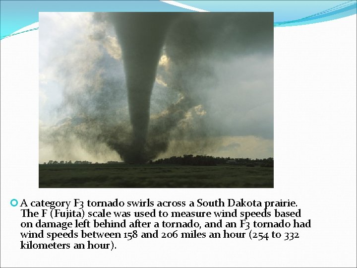  A category F 3 tornado swirls across a South Dakota prairie. The F