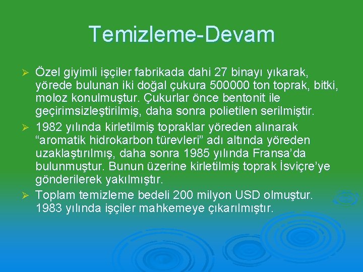 Temizleme-Devam Özel giyimli işçiler fabrikada dahi 27 binayı yıkarak, yörede bulunan iki doğal çukura