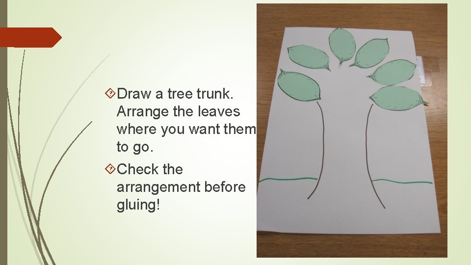  Draw a tree trunk. Arrange the leaves where you want them to go.