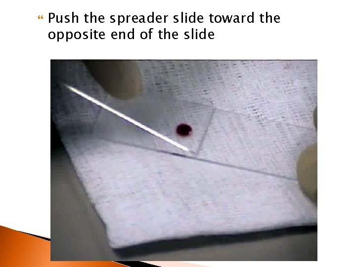  Push the spreader slide toward the opposite end of the slide 