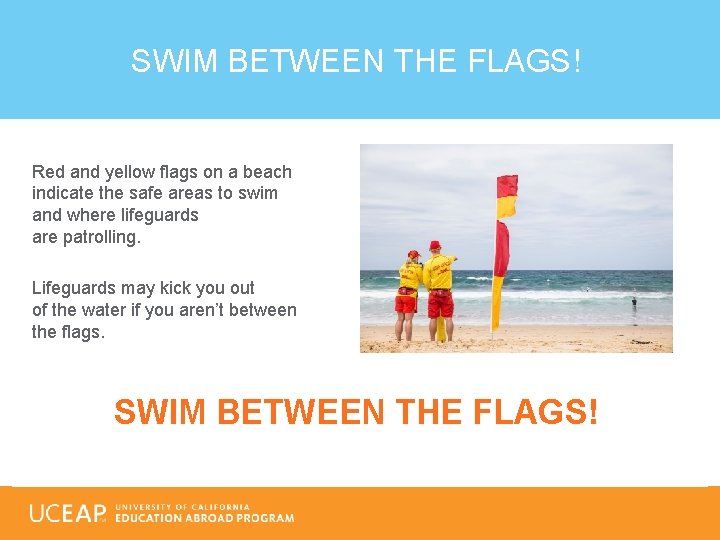 SWIM BETWEEN THE FLAGS! Red and yellow flags on a beach indicate the safe