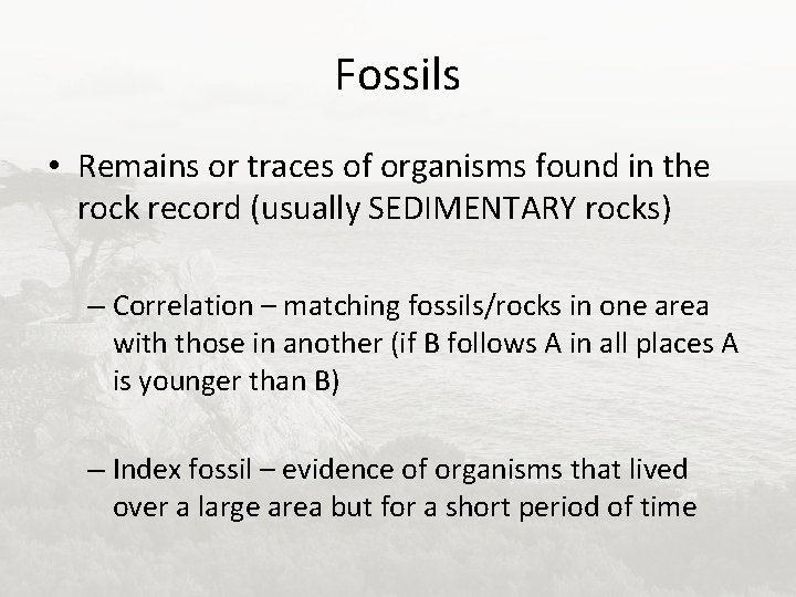 Fossils • Remains or traces of organisms found in the rock record (usually SEDIMENTARY