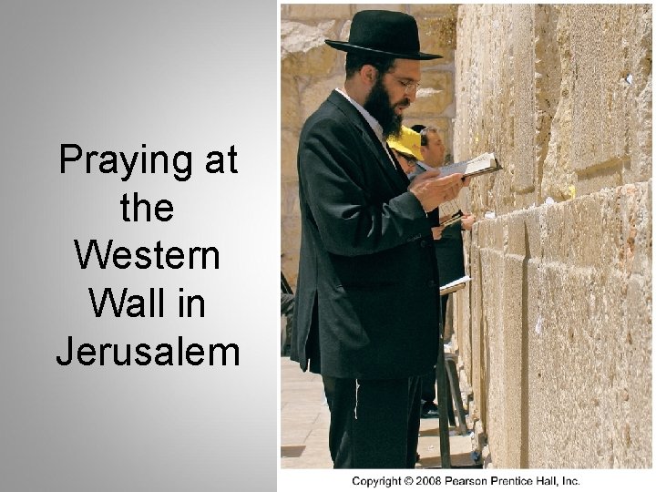 Praying at the Western Wall in Jerusalem Praying at the Western Wall in Jerusalem