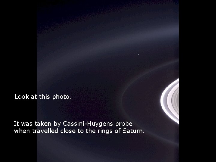 Héla aquí, pues: Look at this photo. It was taken by Cassini-Huygens probe when
