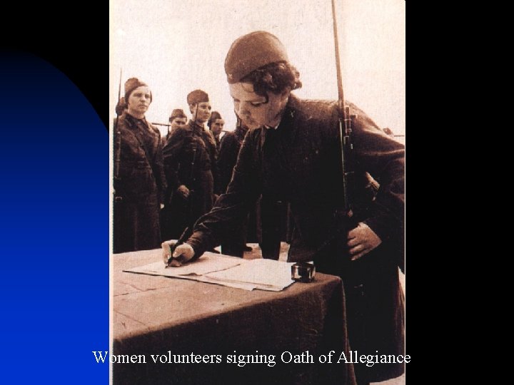 Women volunteers signing Oath of Allegiance 