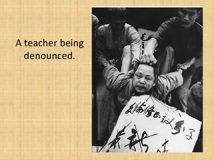 A teacher being denounced. 