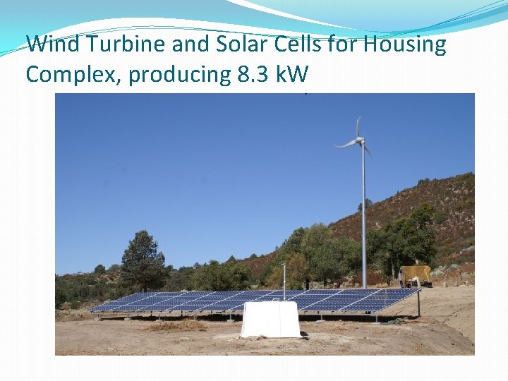 Wind Turbine and Solar Cells for Housing Complex, producing 8. 3 k. W 