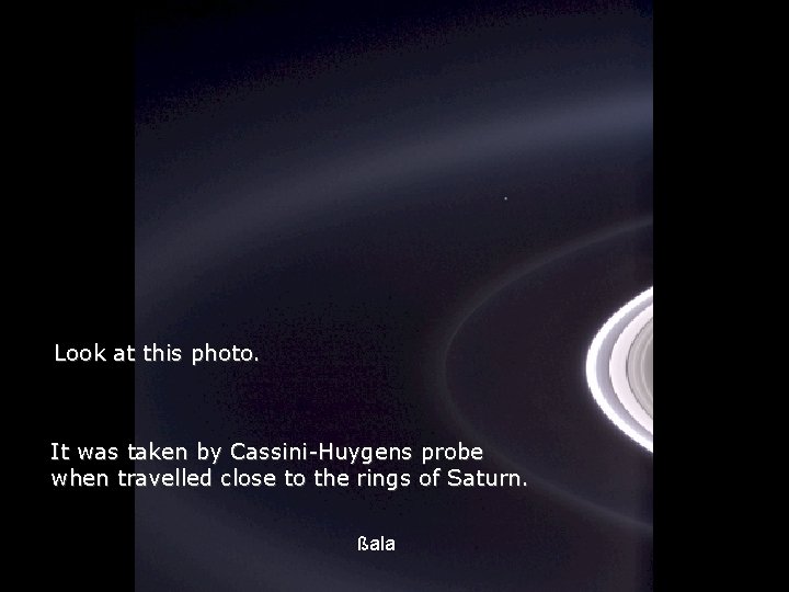 Héla aquí, pues: Look at this photo. It was taken by Cassini-Huygens probe when