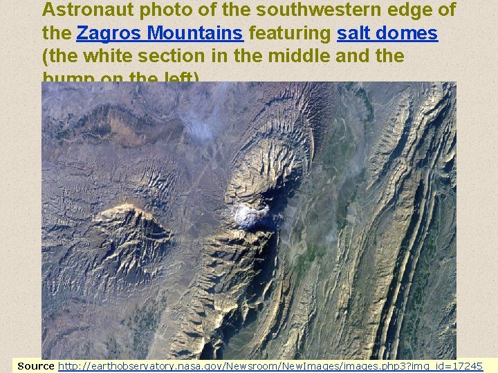 Astronaut photo of the southwestern edge of the Zagros Mountains featuring salt domes (the