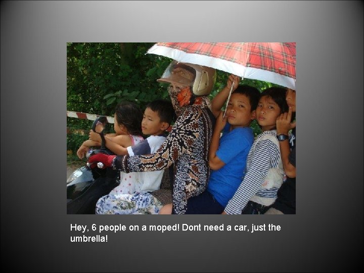 Hey, 6 people on a moped! Dont need a car, just the umbrella! 