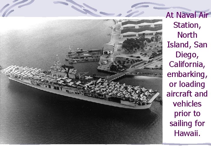 At Naval Air Station, North Island, San Diego, California, embarking, or loading aircraft and