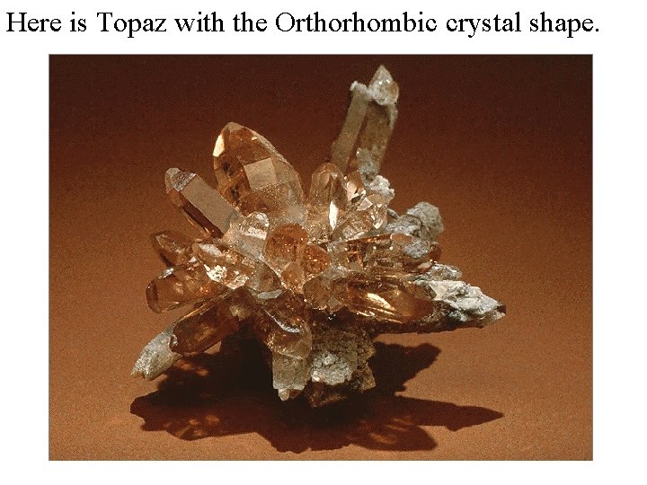 Here is Topaz with the Orthorhombic crystal shape. 