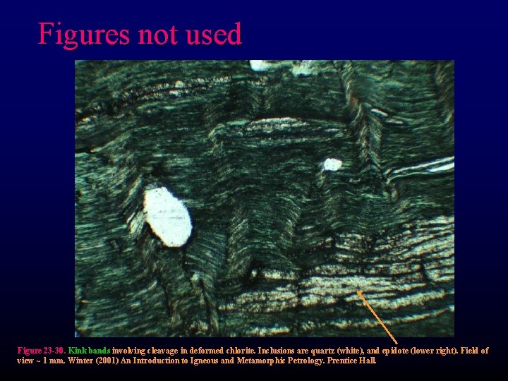 Figures not used Figure 23 -30. Kink bands involving cleavage in deformed chlorite. Inclusions