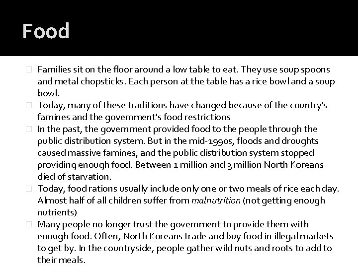 Food � � � Families sit on the floor around a low table to