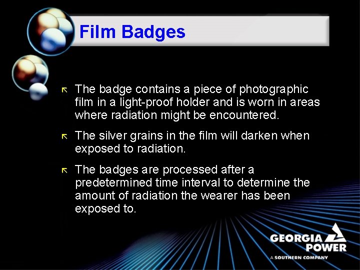 Film Badges ã The badge contains a piece of photographic film in a light-proof