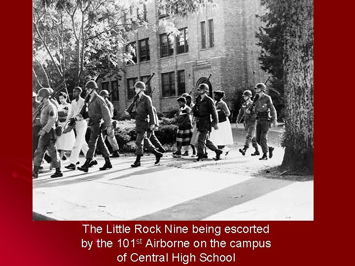 The Little Rock Nine being escorted by the 101 st Airborne on the campus