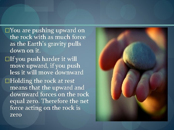 �You are pushing upward on the rock with as much force as the Earth’s